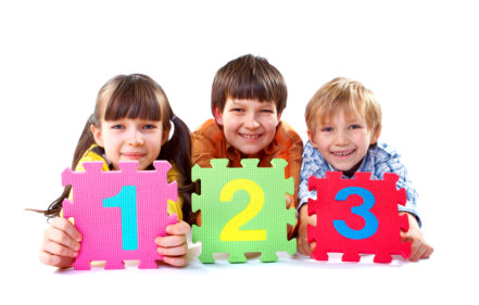 three children with number card